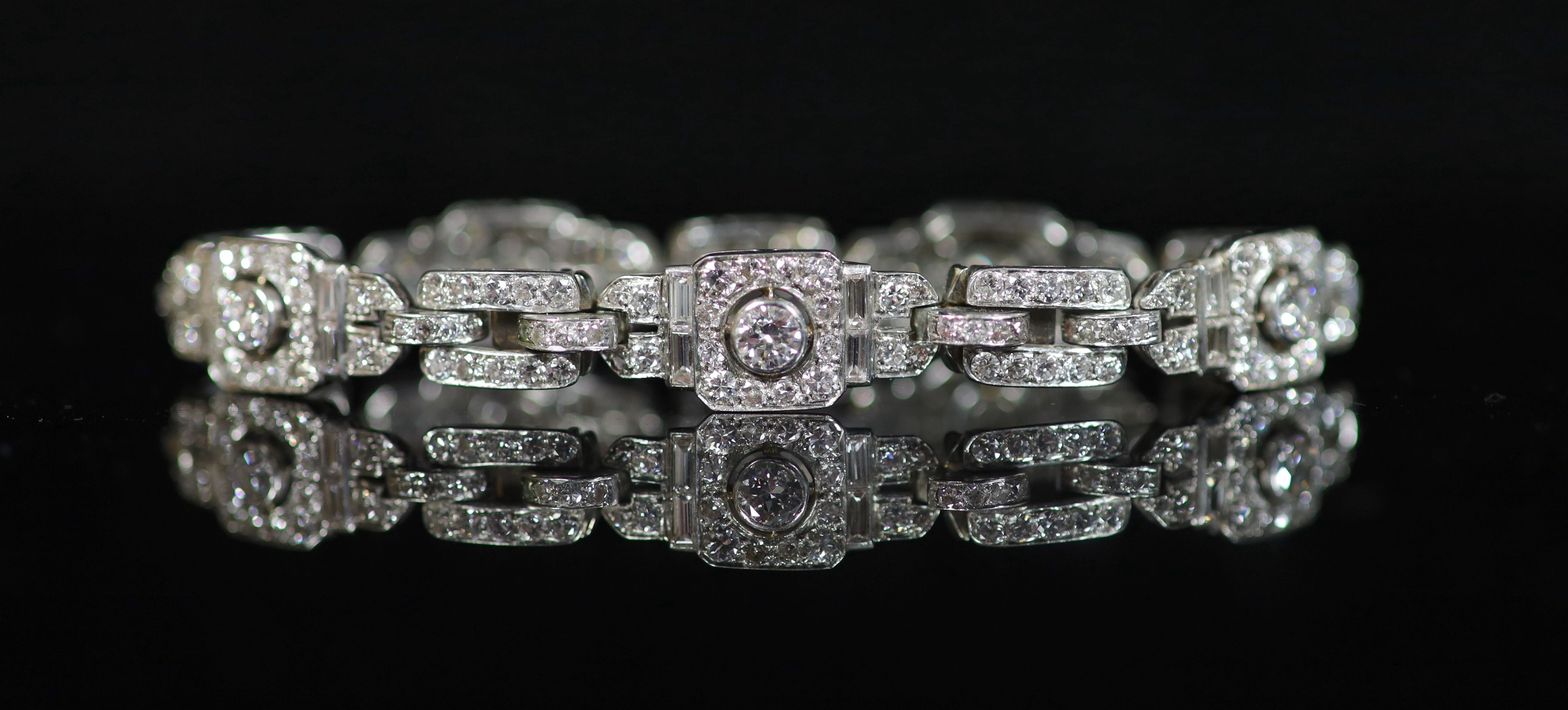 A mid 20th century platinum and diamond encrusted rectangular link bracelet